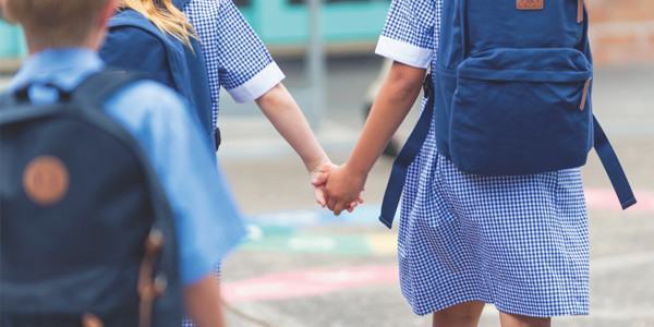 school-children-holding-hands