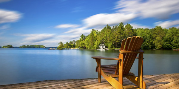 chair-on-the-dock-overlooking-the-lake